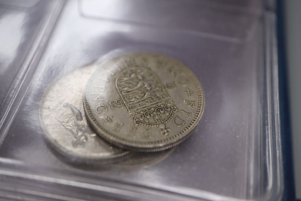 Two albums of world coins and other UK coinage including pennies